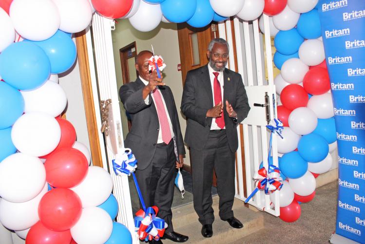Britam Holdings Group Managing Director Dr. Benson Wairegi (L) with the University of Nairobi Vice Chancellor, Prof. Stephen Kiama during the launch of the newly refurbished Department of Surgery.